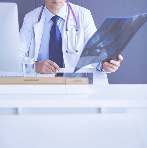 Close up of male doctor holding x-ray or roentgen image — Stock Photo, Image