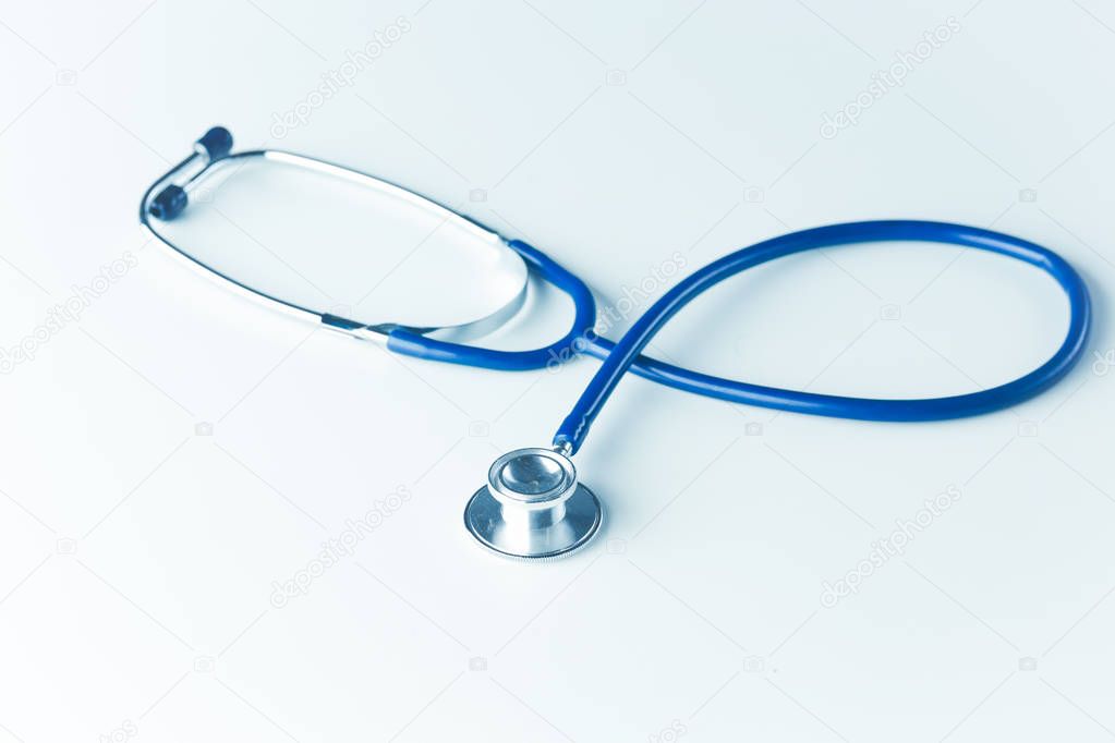 Medical stethoscope or phonendoscope on white background