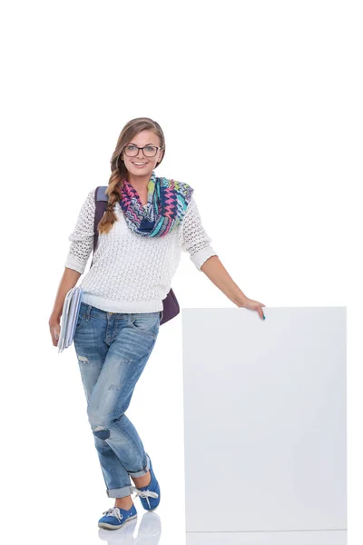 Beautiful student woman pointing on blank board. Student — Stock Photo, Image