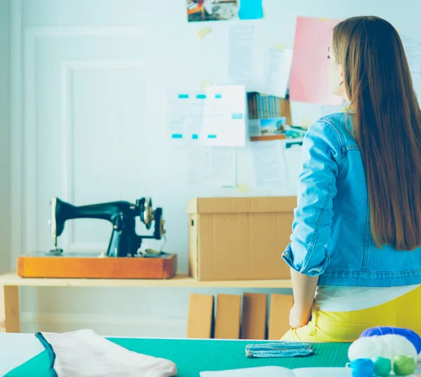 Female designer in office working on architects project — Stock Photo, Image