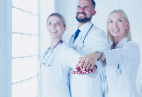 Doctors and nurses coordinate hands. Concept Teamwork in hospital for success work and trust in team — Stock Photo, Image