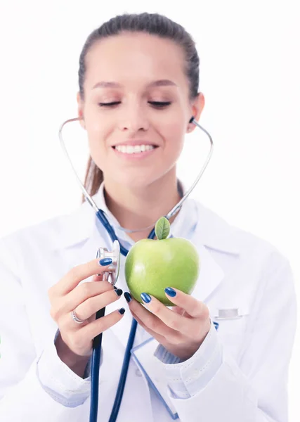Ärztin untersucht Apfel mit Stethoskop. Ärztinnen — Stockfoto