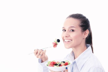 Sağlıklı yemek yiyen güzel bir kız. Güzel kız.