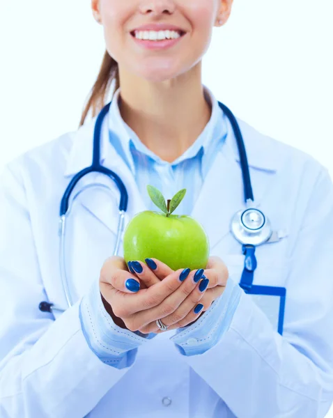 Mulher sorridente doutor com uma maçã verde. Mulher médica — Fotografia de Stock