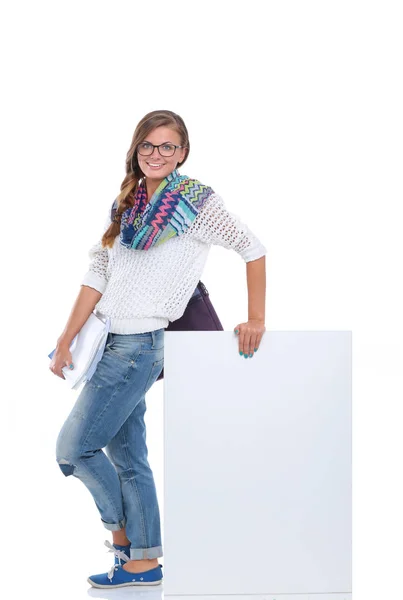 Beautiful student woman pointing on blank board. Student. — Stock Photo, Image