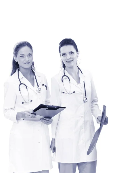 Two woman nurse watching X Ray image, standing in hospital. X Ray . Two woman doctor. — Stock Photo, Image