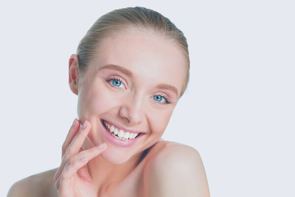 Portrait of beautiful woman with natural make up on white background