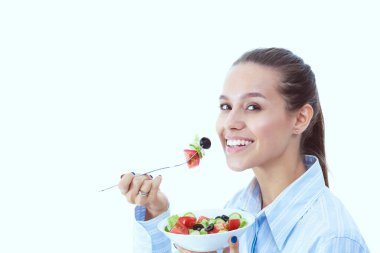 Sağlıklı yemek yiyen güzel bir kız. Güzel kız.