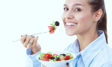 Sağlıklı yemek yiyen güzel bir kız. Güzel kız.