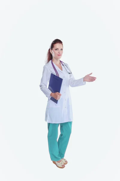 Smiling female doctor with a folder in uniform standing at hospital. Smiling female doctor — Stock Photo, Image