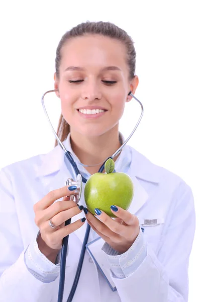 Ärztin untersucht Apfel mit Stethoskop. Ärztinnen — Stockfoto