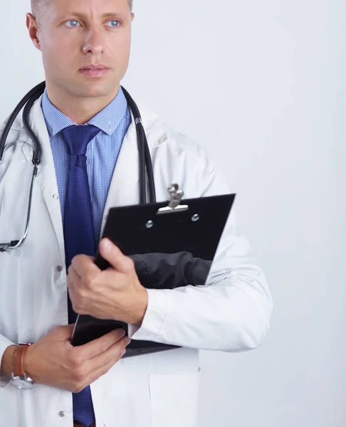 Male doctor standing with folder, isolated on white background — Stock Photo, Image