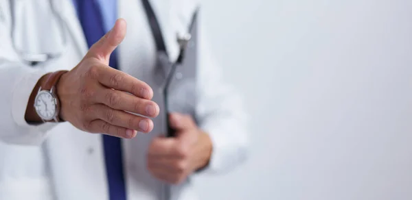 Friendly male doctor with open hand ready for hugging — Stock Photo, Image