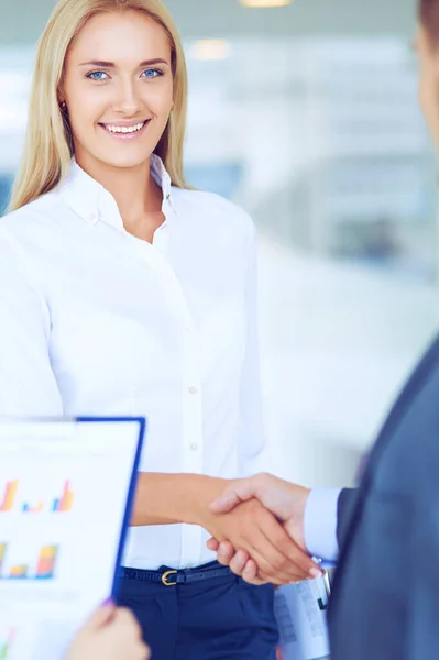 Two successful business people shaking hands with each other — Stock Photo, Image