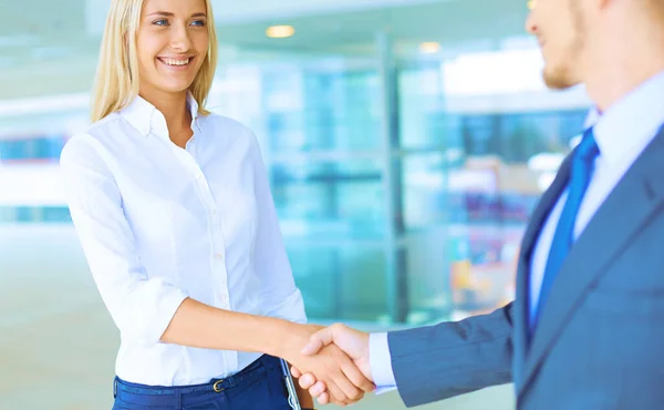 Two successful business people shaking hands with each other — Stock Photo, Image