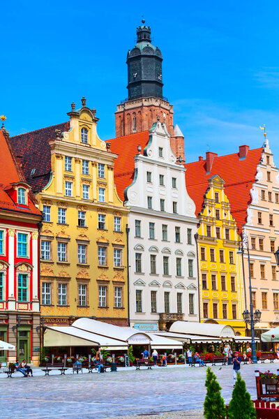 Wroclaw, Poland - June 21, 2019: Old Town Rynek Market Square with colorful houses, people