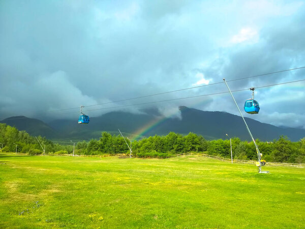 Summer Bansko, Bulgaria landscape with rainbow