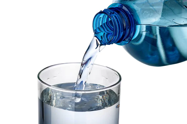 L'eau coulant dans un verre Photo De Stock