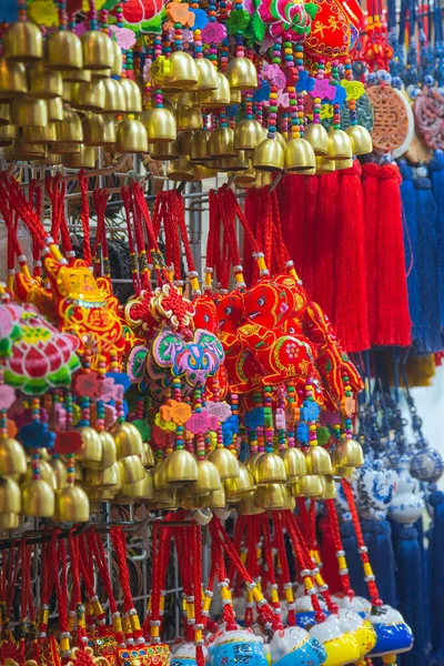 trade in multicolored tinsel for Chinese new year celebrations in Singapore