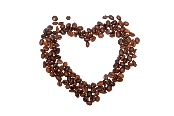 Κόκκοι καφέ σε σχήμα καρδιάς σε λευκό φόντο. — Φωτογραφία Αρχείου
