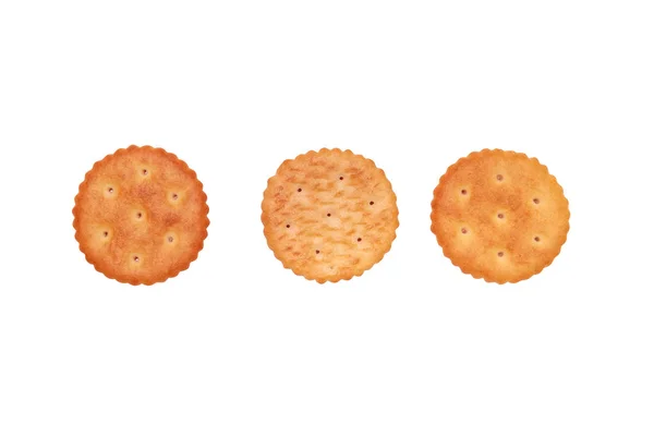 Nahaufnahme von runden Crackern auf weißem Hintergrund. — Stockfoto