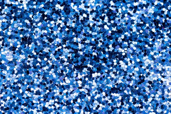 Shiny background with yellow and blue glitter close up. — Stock Photo, Image