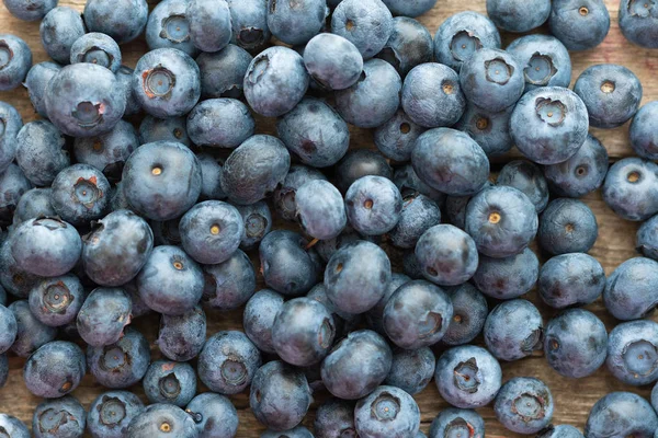 Ahşap arka planda taze Blueberry, üst görünüm. — Stok fotoğraf