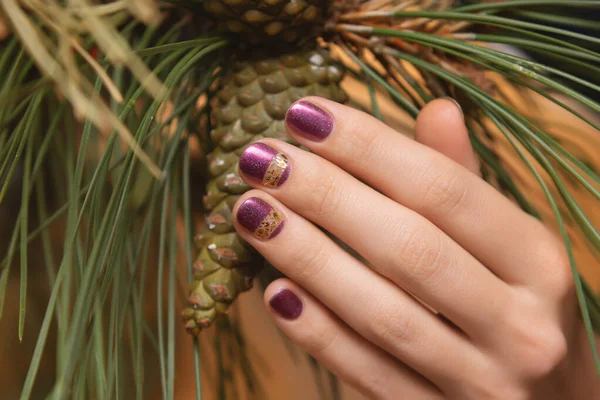 Female hand with purple glitter nail design — Stock Photo, Image