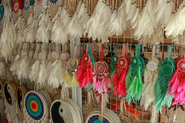 Various design of dream catchers selling in the store. Dream catchers in the shop, close up of dream catchers