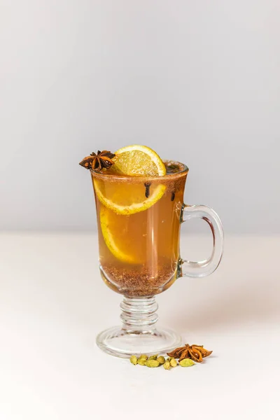 herbal tea with spices on white background