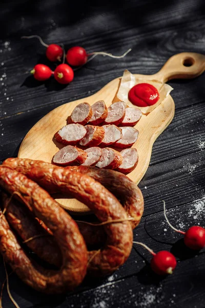 Tasty and juicy meat sausages. Smoked sausages.