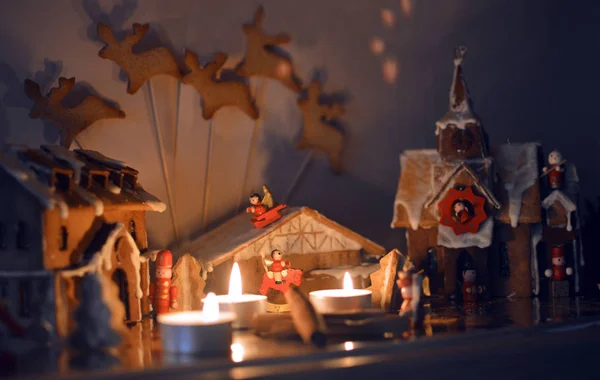 Magic miniature village made of gingerbread on Christmas
