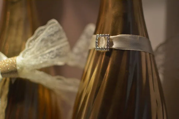 Two Golden Wedding Champaigne Bottles Decorated Sparkling Jewelry Rhinestones White — Stock Photo, Image