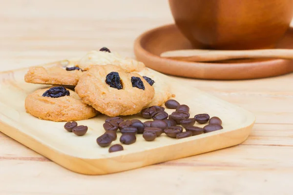 Biscoitos Passas Com Semente Café Seca Mesa Madeira Com Xícara — Fotografia de Stock