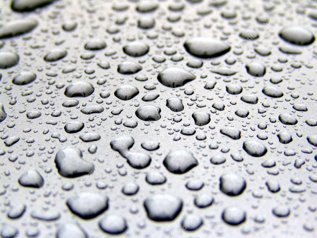 selective focus of water drops on surface