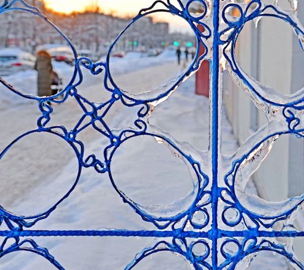Fragment of icy lattice of fencing — Stock Photo, Image