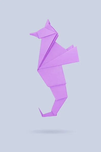 Origami abstracto caballo de mar aislado en un fondo gris —  Fotos de Stock
