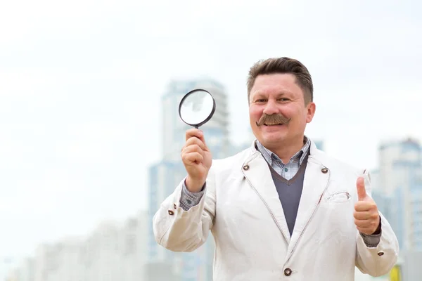 Adult Middle Aged Man Mustache Holds Magnifying Glass His Hands — Stock Photo, Image