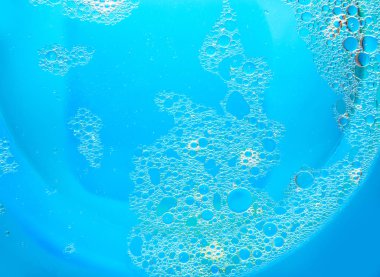 Su mavi arka plan üzerine daireler. Metin için arka plan.