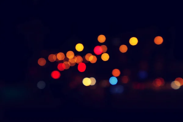 光の街のボケを色します 夜の街 抽象的な背景 — ストック写真
