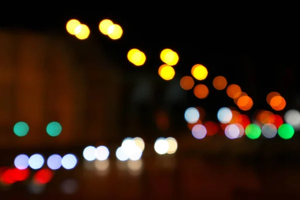 Color bokeh of light city street. Night city. Abstract background.