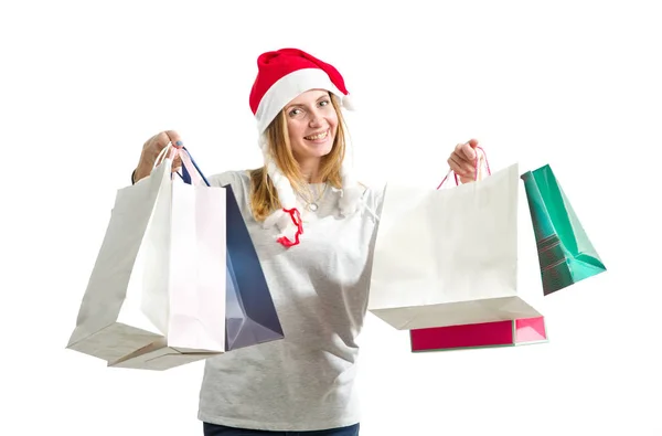 Молодая Женщина Держит Пакет Новогодними Подарками Белом Фоне Рождественские Покупки — стоковое фото