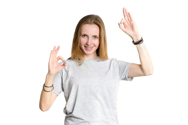 白い背景の上を示しています若い女性の肖像画指をパーセント記号または のシンボル — ストック写真