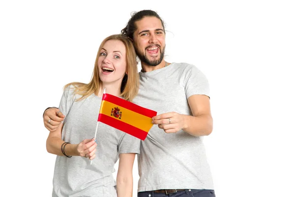 陽気な若いカップル 男性と女性 スペイン 白い背景で隔離の旗の — ストック写真