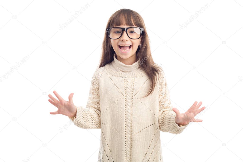 Portrait of a little girl of 7 years old with glasses showing all ten fingers, isolated on white background.