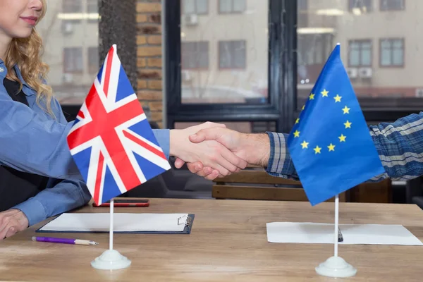 Close up handshake between people from Europe and Great Britain.