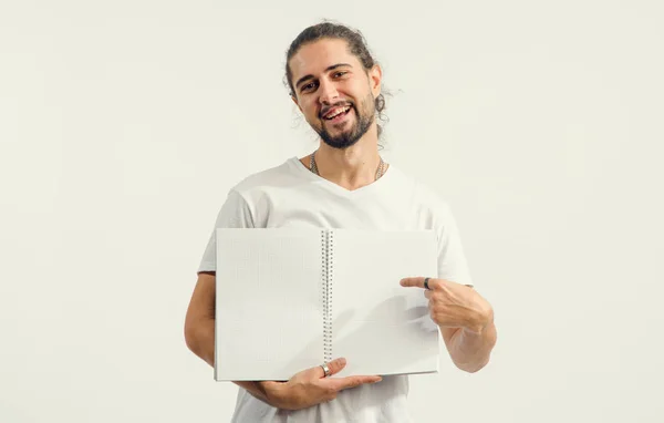 Young Man Beard Shows Open Notebook Clean Pages Place Text — Stock Photo, Image