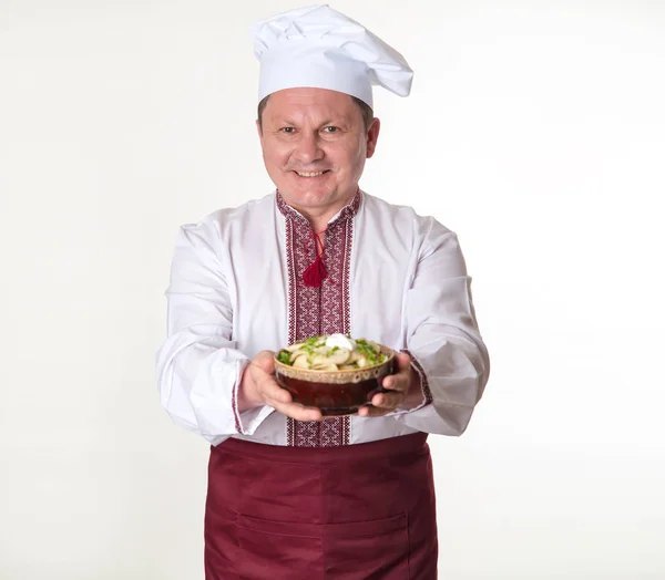 Chefe Tem Bolinhos Saborosos Nas Mãos Homem Cozinheiro Roupas Nacionais — Fotografia de Stock