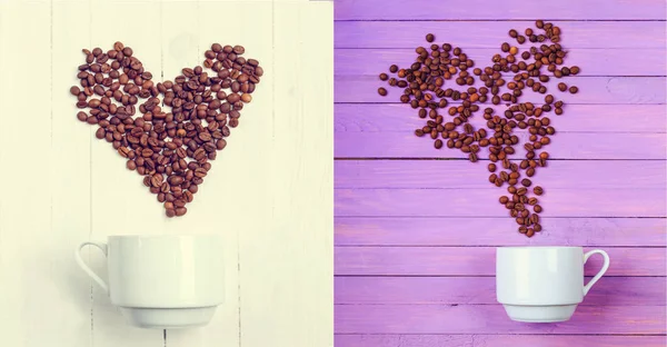 Grain of coffee in the form of a heart over a cup. Top view. Postcard. Flat lay image.