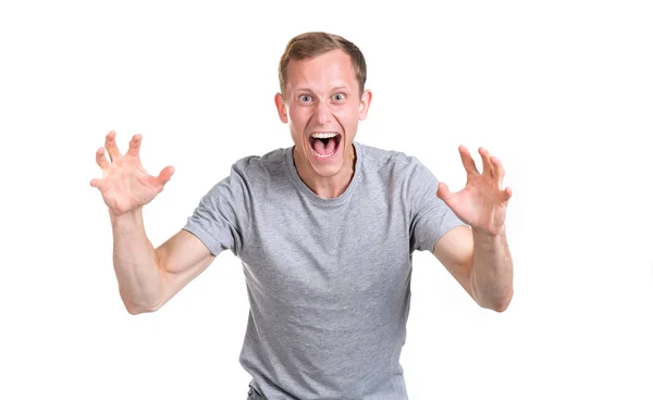 Young Man Gray Shirt Screams Holds His Hands Different Directions — Stock Photo, Image